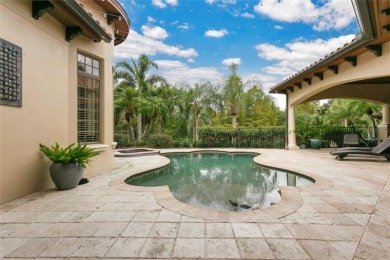 Experience the art of fine living in this exquisite one-story on Isleworth Golf and Country Club in Florida - for sale on GolfHomes.com, golf home, golf lot