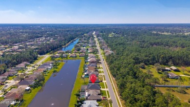 Relax in this quiet 4 bedroom pool home, with low-maintenance on Crane Lakes Golf and Country Club in Florida - for sale on GolfHomes.com, golf home, golf lot