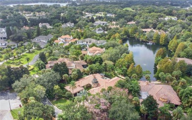 Experience the art of fine living in this exquisite one-story on Isleworth Golf and Country Club in Florida - for sale on GolfHomes.com, golf home, golf lot