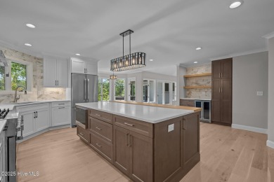 Coastal living at its finest with this exceptionally renovated on Olde Point Golf and Country Club in North Carolina - for sale on GolfHomes.com, golf home, golf lot