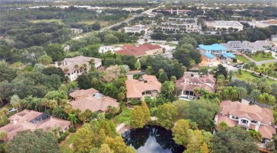 Experience the art of fine living in this exquisite one-story on Isleworth Golf and Country Club in Florida - for sale on GolfHomes.com, golf home, golf lot