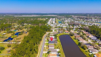 Relax in this quiet 4 bedroom pool home, with low-maintenance on Crane Lakes Golf and Country Club in Florida - for sale on GolfHomes.com, golf home, golf lot