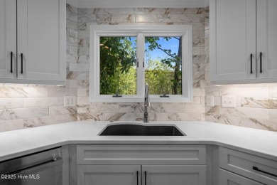 Coastal living at its finest with this exceptionally renovated on Olde Point Golf and Country Club in North Carolina - for sale on GolfHomes.com, golf home, golf lot