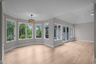 Coastal living at its finest with this exceptionally renovated on Olde Point Golf and Country Club in North Carolina - for sale on GolfHomes.com, golf home, golf lot