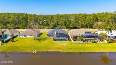 Relax in this quiet 4 bedroom pool home, with low-maintenance on Crane Lakes Golf and Country Club in Florida - for sale on GolfHomes.com, golf home, golf lot