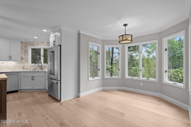 Coastal living at its finest with this exceptionally renovated on Olde Point Golf and Country Club in North Carolina - for sale on GolfHomes.com, golf home, golf lot