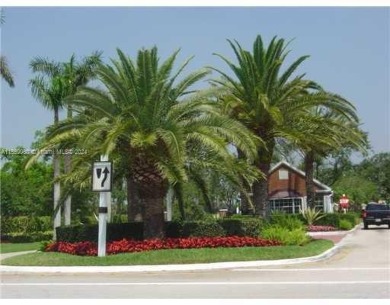 Nestled in a cul-de-sac, within the prestigious gated community on TPC Eagle Trace in Florida - for sale on GolfHomes.com, golf home, golf lot
