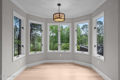 Coastal living at its finest with this exceptionally renovated on Olde Point Golf and Country Club in North Carolina - for sale on GolfHomes.com, golf home, golf lot