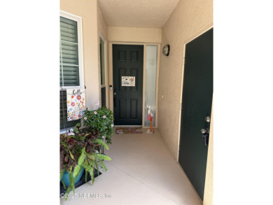 You will love this 1st floor end unit with lots of light and on St. Augustine Shores Golf Club in Florida - for sale on GolfHomes.com, golf home, golf lot