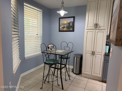 You will love this 1st floor end unit with lots of light and on St. Augustine Shores Golf Club in Florida - for sale on GolfHomes.com, golf home, golf lot