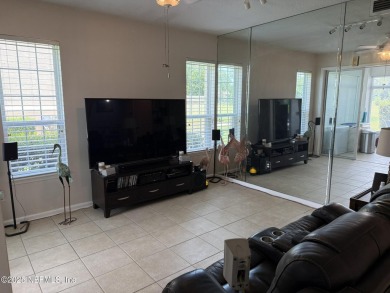 You will love this 1st floor end unit with lots of light and on St. Augustine Shores Golf Club in Florida - for sale on GolfHomes.com, golf home, golf lot