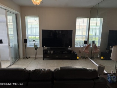 You will love this 1st floor end unit with lots of light and on St. Augustine Shores Golf Club in Florida - for sale on GolfHomes.com, golf home, golf lot