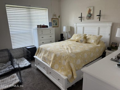 You will love this 1st floor end unit with lots of light and on St. Augustine Shores Golf Club in Florida - for sale on GolfHomes.com, golf home, golf lot