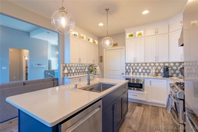 This is an amazing villa recently updated with high-end finishes on Seasons Ridge At Four Seasons in Missouri - for sale on GolfHomes.com, golf home, golf lot