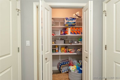 This is an amazing villa recently updated with high-end finishes on Seasons Ridge At Four Seasons in Missouri - for sale on GolfHomes.com, golf home, golf lot