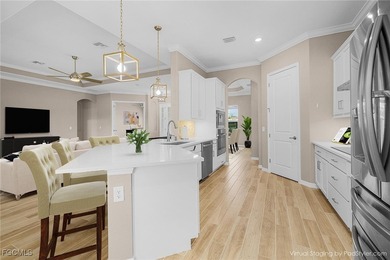 Welcome Home! Step into this beautifully designed Napoli Grande on Heritage Landing Golf  in Florida - for sale on GolfHomes.com, golf home, golf lot