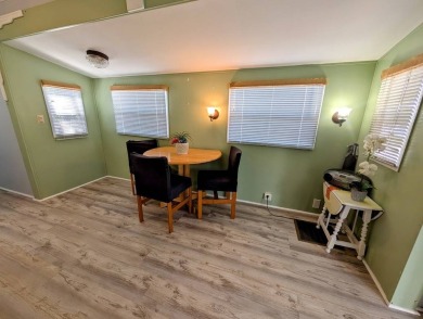 This Unit has a site built addition that includes a laundry or on Cane Garden Golf Course in Florida - for sale on GolfHomes.com, golf home, golf lot