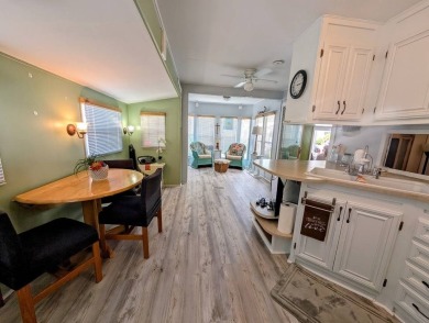 This Unit has a site built addition that includes a laundry or on Cane Garden Golf Course in Florida - for sale on GolfHomes.com, golf home, golf lot