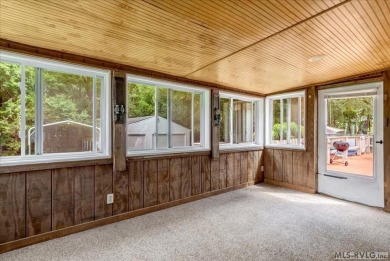 Lakeside Retreat in Tanglewood Shores! Welcome to your getaway on Tanglewood Shores Golf Club in Virginia - for sale on GolfHomes.com, golf home, golf lot