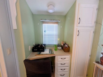 This Unit has a site built addition that includes a laundry or on Cane Garden Golf Course in Florida - for sale on GolfHomes.com, golf home, golf lot