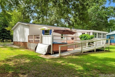 Lakeside Retreat in Tanglewood Shores! Welcome to your getaway on Tanglewood Shores Golf Club in Virginia - for sale on GolfHomes.com, golf home, golf lot