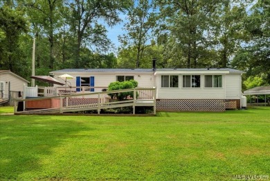 Lakeside Retreat in Tanglewood Shores! Welcome to your getaway on Tanglewood Shores Golf Club in Virginia - for sale on GolfHomes.com, golf home, golf lot