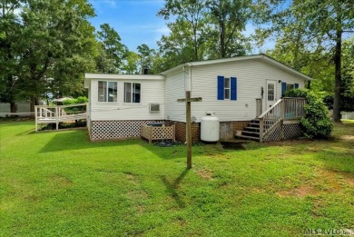 Lakeside Retreat in Tanglewood Shores! Welcome to your getaway on Tanglewood Shores Golf Club in Virginia - for sale on GolfHomes.com, golf home, golf lot