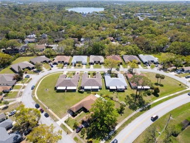 **REDUCED PRICE** Dog Friendly Neighborhood - Welcome to this on Highland Lakes Executive Golf Course in Florida - for sale on GolfHomes.com, golf home, golf lot