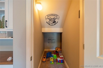 This is an amazing villa recently updated with high-end finishes on Seasons Ridge At Four Seasons in Missouri - for sale on GolfHomes.com, golf home, golf lot