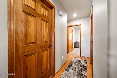 Located among mature pines in the beautiful White Mountains on Bison Golf and Country Club in Arizona - for sale on GolfHomes.com, golf home, golf lot