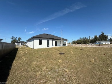 Welcome to a breathtaking new construction single-family home on Palmetto-Pine Country Club in Florida - for sale on GolfHomes.com, golf home, golf lot