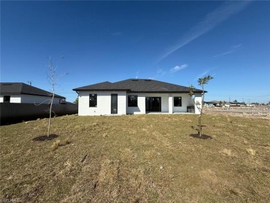 Welcome to a breathtaking new construction single-family home on Palmetto-Pine Country Club in Florida - for sale on GolfHomes.com, golf home, golf lot