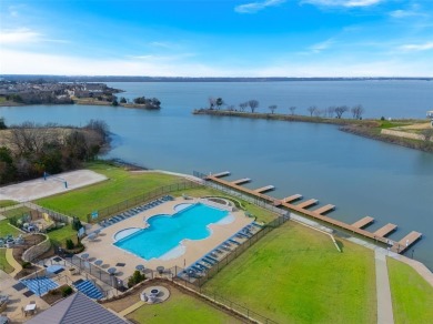 Nestled in the coveted Heath Golf  Yacht Club community, this on Heath Golf and Yacht Club in Texas - for sale on GolfHomes.com, golf home, golf lot