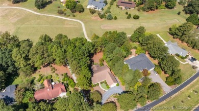 Nestled along the 3rd fairway of the Carolina Trace Lake Course on Carolina Trace Country Club in North Carolina - for sale on GolfHomes.com, golf home, golf lot