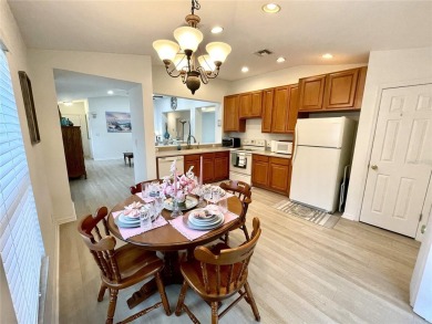 Under contract-accepting backup offers. Beautiful 3/2/2 with a on Kingsway Country Club in Florida - for sale on GolfHomes.com, golf home, golf lot