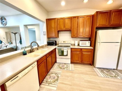 Under contract-accepting backup offers. Beautiful 3/2/2 with a on Kingsway Country Club in Florida - for sale on GolfHomes.com, golf home, golf lot