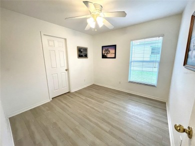 Under contract-accepting backup offers. Beautiful 3/2/2 with a on Kingsway Country Club in Florida - for sale on GolfHomes.com, golf home, golf lot