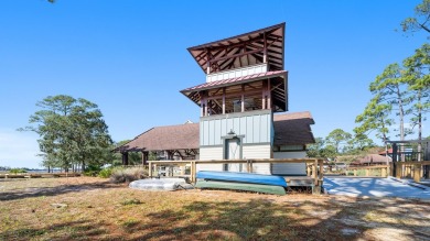 Discover serenity lakefront within the exclusive gated community on Sharks Tooth Golf Club in Florida - for sale on GolfHomes.com, golf home, golf lot