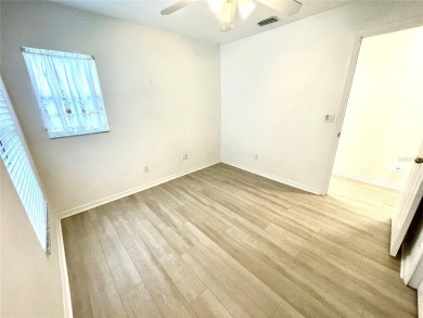 Under contract-accepting backup offers. Beautiful 3/2/2 with a on Kingsway Country Club in Florida - for sale on GolfHomes.com, golf home, golf lot