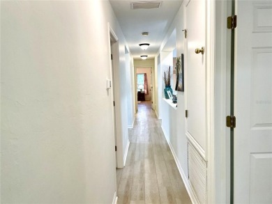 Under contract-accepting backup offers. Beautiful 3/2/2 with a on Kingsway Country Club in Florida - for sale on GolfHomes.com, golf home, golf lot