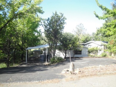 GREAT REMODELED WITH NEW PAINT, FLOORING, ROOF & APPLIANCES on Lake Oroville Golf and Event Center in California - for sale on GolfHomes.com, golf home, golf lot