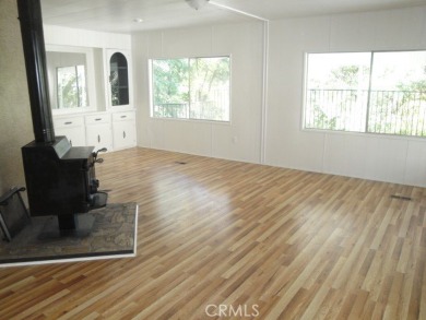 GREAT REMODELED WITH NEW PAINT, FLOORING, ROOF & APPLIANCES on Lake Oroville Golf and Event Center in California - for sale on GolfHomes.com, golf home, golf lot