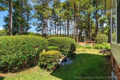 Nestled along the 3rd fairway of the Carolina Trace Lake Course on Carolina Trace Country Club in North Carolina - for sale on GolfHomes.com, golf home, golf lot