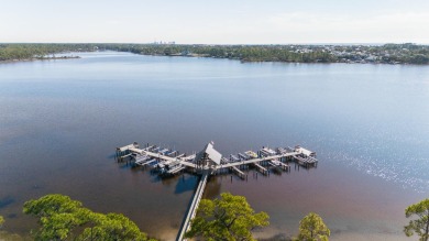 Discover serenity lakefront within the exclusive gated community on Sharks Tooth Golf Club in Florida - for sale on GolfHomes.com, golf home, golf lot