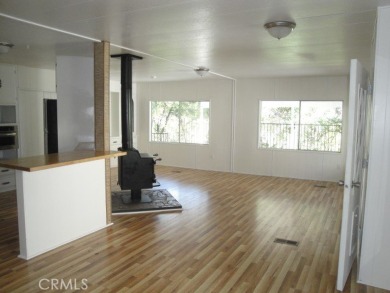 GREAT REMODELED WITH NEW PAINT, FLOORING, ROOF & APPLIANCES on Lake Oroville Golf and Event Center in California - for sale on GolfHomes.com, golf home, golf lot