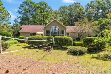 Nestled along the 3rd fairway of the Carolina Trace Lake Course on Carolina Trace Country Club in North Carolina - for sale on GolfHomes.com, golf home, golf lot