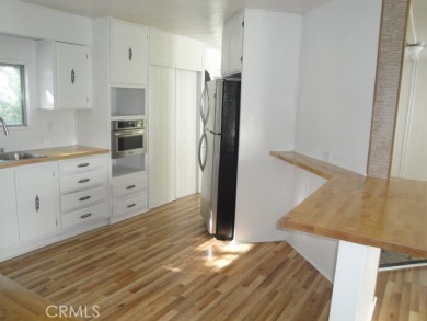 GREAT REMODELED WITH NEW PAINT, FLOORING, ROOF & APPLIANCES on Lake Oroville Golf and Event Center in California - for sale on GolfHomes.com, golf home, golf lot