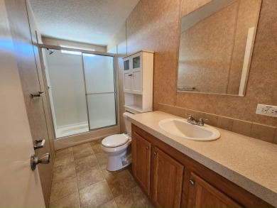 Make your new home in Lake Fairways, a well-maintained on Pine Lakes Country Club in Florida - for sale on GolfHomes.com, golf home, golf lot