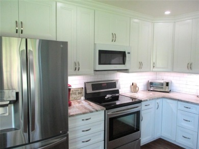 THIS SWEET HOME PACKS A BIG PUNCH !! Tastefully and sensibly on Preserve Golf Club in Florida - for sale on GolfHomes.com, golf home, golf lot
