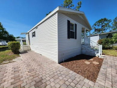 Make your new home in Lake Fairways, a well-maintained on Pine Lakes Country Club in Florida - for sale on GolfHomes.com, golf home, golf lot